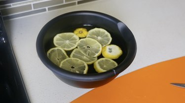 Add lemons to bowl