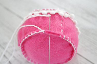 Give one of your hardest working sewing tools the presentation they deserve with a bright handmade pin cushion.