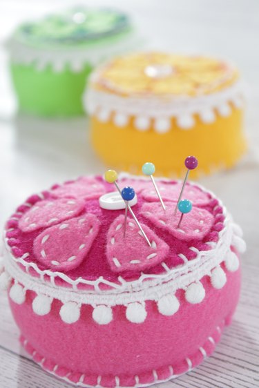 Give one of your hardest working sewing tools the presentation they deserve with a bright handmade pin cushion.
