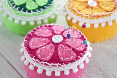 Give one of your hardest working sewing tools the presentation they deserve with a bright handmade pin cushion.