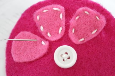 Give one of your hardest working sewing tools the presentation they deserve with a bright handmade pin cushion.