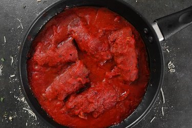 Cook braciole in tomato sauce