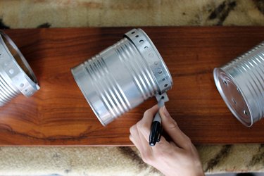 Adding steel strips to hold cans on wood