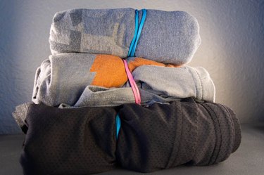 A pyramid of clothes packing hack and rubber band hack