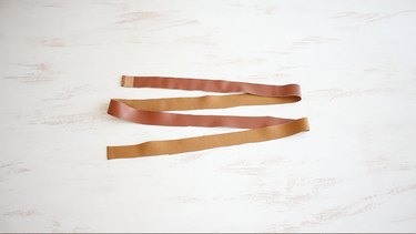 Strip of faux leather cut to 1 x 52 inches