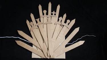 Swords glued on top of spikes