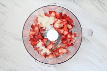 Combine strawberries and sugar