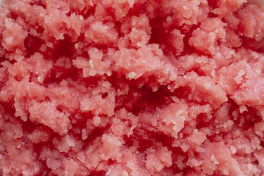 Break up frozen watermelon sorbet to freeze again for watermelon sorbet