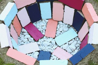 DIY firepit made of colorful bricks and gravel