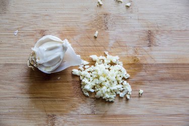 chopped garlic on cutting board