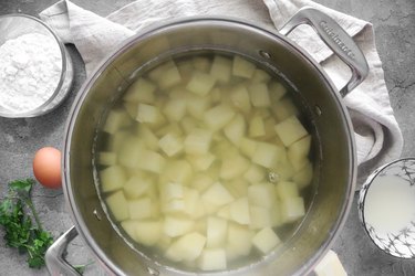 Boil the potatoes