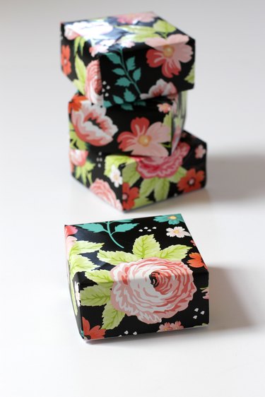 Make a big dramatic statement with a little paper box. They're perfect for those times when you need to add a little flair to a small gift for a friend or loved one. They even make great little wedding favor boxes.