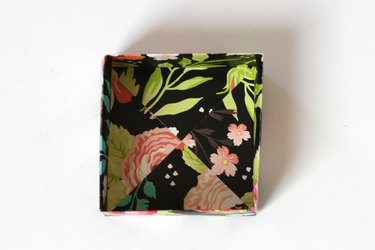 Make a big dramatic statement with a little paper box. They're perfect for those times when you need to add a little flair to a small gift for a friend or loved one. They even make great little wedding favor boxes.
