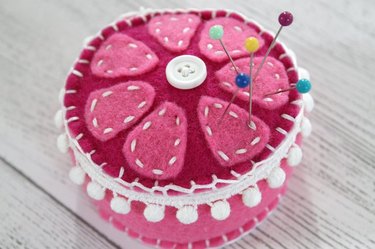 Pink passion fruit pin cushion to hold sewing pins