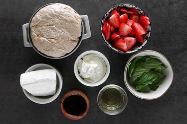 Ingredients for strawberry balsamic brie pizza