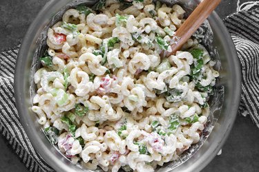 Mix macaroni with dressing