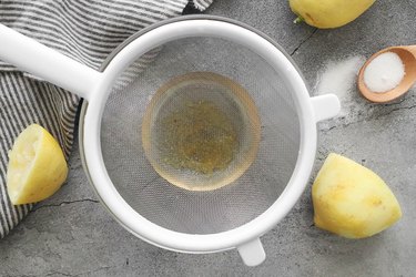 Strain lemon syrup