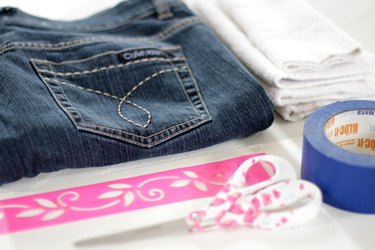Give your plain jeans some personality by using a stencil and bleach to add some fun designs. Cover them with patterns or just put a few strategically placed pictures to alter your jeans and make them your own.