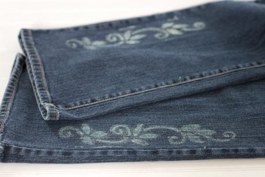 Give your plain jeans some personality by using a stencil and bleach to add some fun designs. Cover them with patterns or just put a few strategically placed pictures to alter your jeans and make them your own.