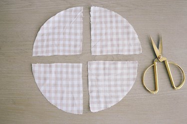 Gingham fabric circle cut into four equal pie pieces