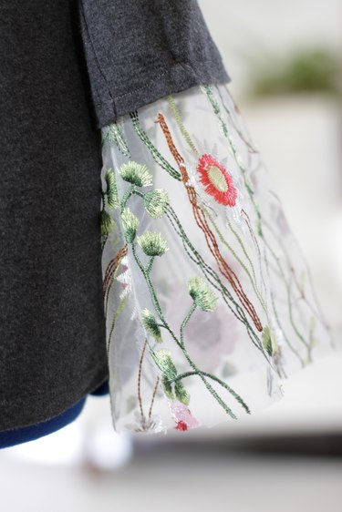 If you'd like to add some fun unexpected detail to an otherwise plain sweater or shirt, a bell sleeve is a nice option. You can use plain fabric to match your shirt or make a fashion statement using something more colorful like an embroidered mesh.