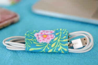Keep those cords under control and detangled with these cute cord holders that you made yourself from a couple of pieces of scrap fabric.