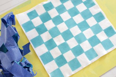 Create this handy checkerboard that's lightweight and convenient enough to throw in a drawer of your camper or even tote along in your backpack.