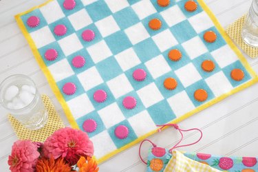 Create this handy checkerboard that's lightweight and convenient enough to throw in a drawer of your camper or even tote along in your backpack.