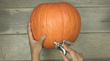 Attaching beverage dispensing spigot to pumpkin for DIY pumpkin keg