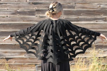 Embrace your spooky side, add a little mystery to your wardrobe and you might even catch some fun in your web when you wear this easy-to-make, no-sew, felt spiderweb poncho.