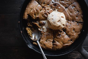 Adorn the skillet cookie with your desired toppings and serve warm.