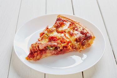 Close-Up Of Pizza In Plate On Table