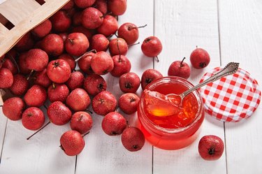 Jar with teaspoon jelly hawthorn