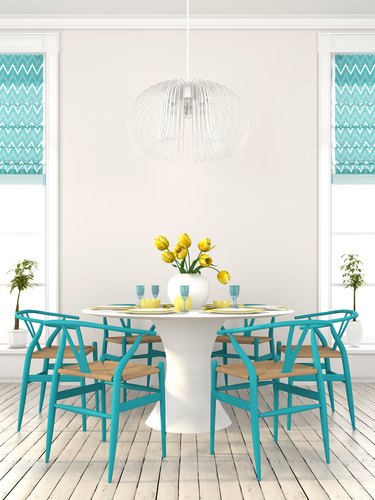 Stylish dining room with blue furniture