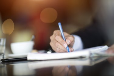 Businessman working at cafe