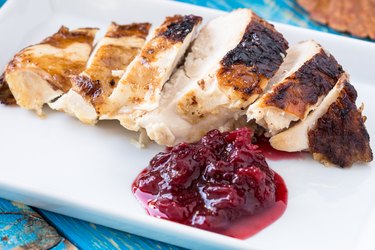 Sliced turkey breast with cranberry sauce