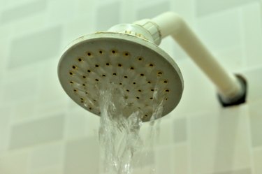 Close-Up Of Water Falling From Shower Head