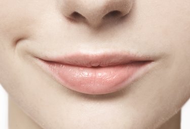 Close up of smiling, natural lips