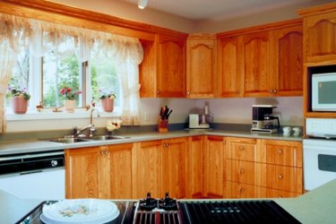 Ceramic Tile Matches Honey Oak Cabinets