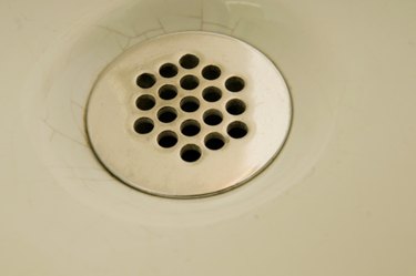 How to unclog a drain without calling a plumber