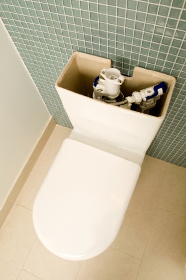 How to Stop a Trickling Toilet Tank