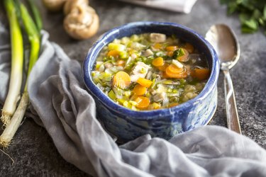 Turkey soup with leek, carrots, noodles, spring onions, champignons and parsley