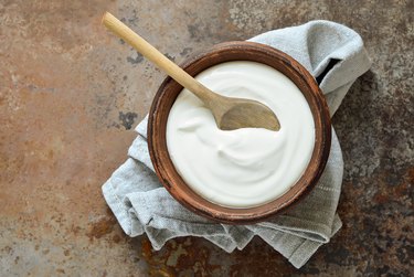 Homemade yogurt in wood bowl
