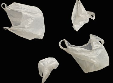 White plastic bags floating in space