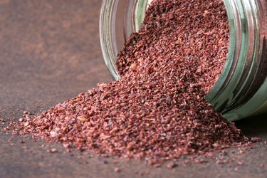 Ground Sumac Spilled From A Spice Jar