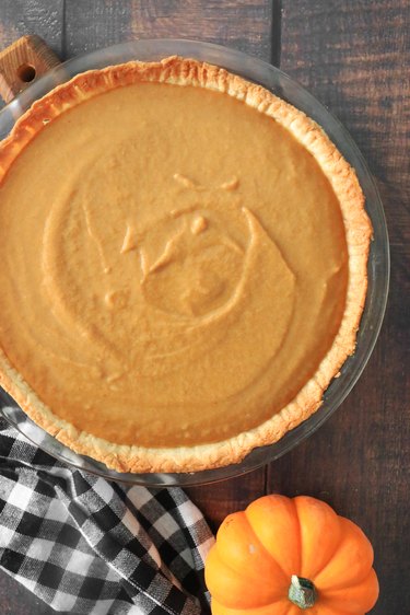 Fill the crust with pumpkin pie filling