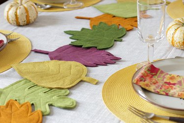 This colorful DIY felt fall leaves table runner is easy to make, will brighten up your fall table and make all your meals feel special.