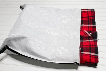 Bring a cozy feeling into a winter tote by creating this bag from a thrift store find or make a super-special cuddly tote from the shirt of a loved one.