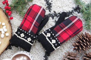 Take an old flannel shirt that's been hanging around the thrift store or maybe even a loved ones old shirt to create some mittens.