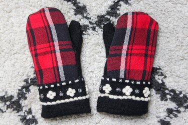 Take an old flannel shirt that's been hanging around the thrift store or maybe even a loved ones old shirt to create some mittens.
